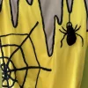 justaucorps jaune araignée